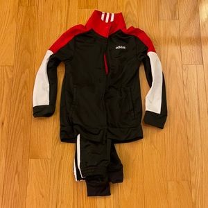 Adidas track suit. Boys size 7